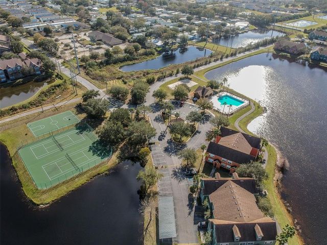 9064 LAKE CHASE ISLAND WAY, Tampa, FL 33626