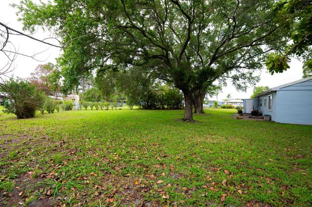 402 SW Ruffner Court, Port St. Lucie, Port St Lucie, FL 34953