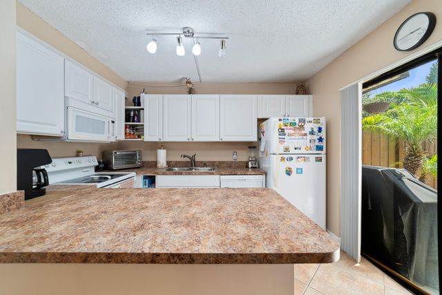 1704 FOREST LAKES Circle A, West Palm Beach, FL 33406