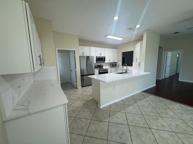981 NW Tuscany Drive, Port St. Lucie, Port St Lucie, FL 34986