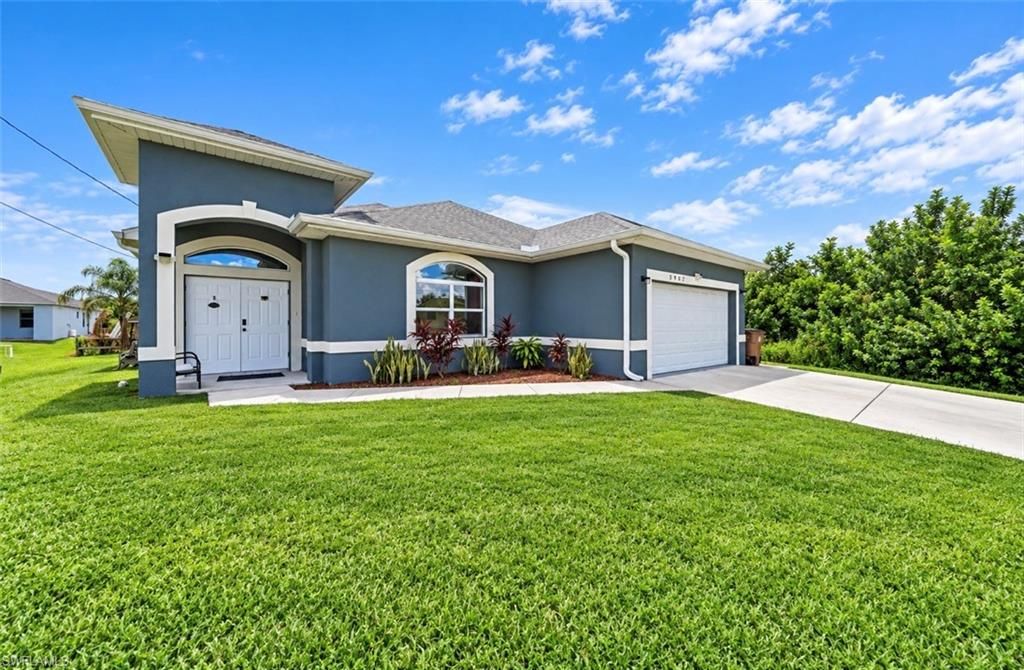 3907 11th ST SW, LEHIGH ACRES, FL 33976 — photo 2