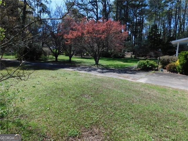 5265 Five Forks Trickum Road SW, Lilburn, GA 30047