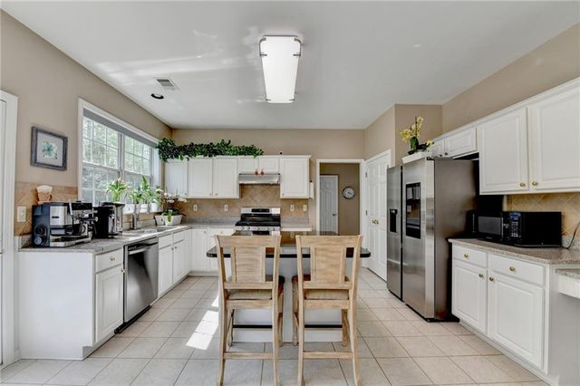 5066 Wellisford Court, Suwanee, GA 30024