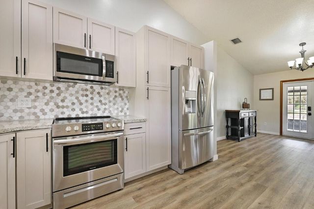 18080 W Sycamore Drive, The Acreage, FL 33470