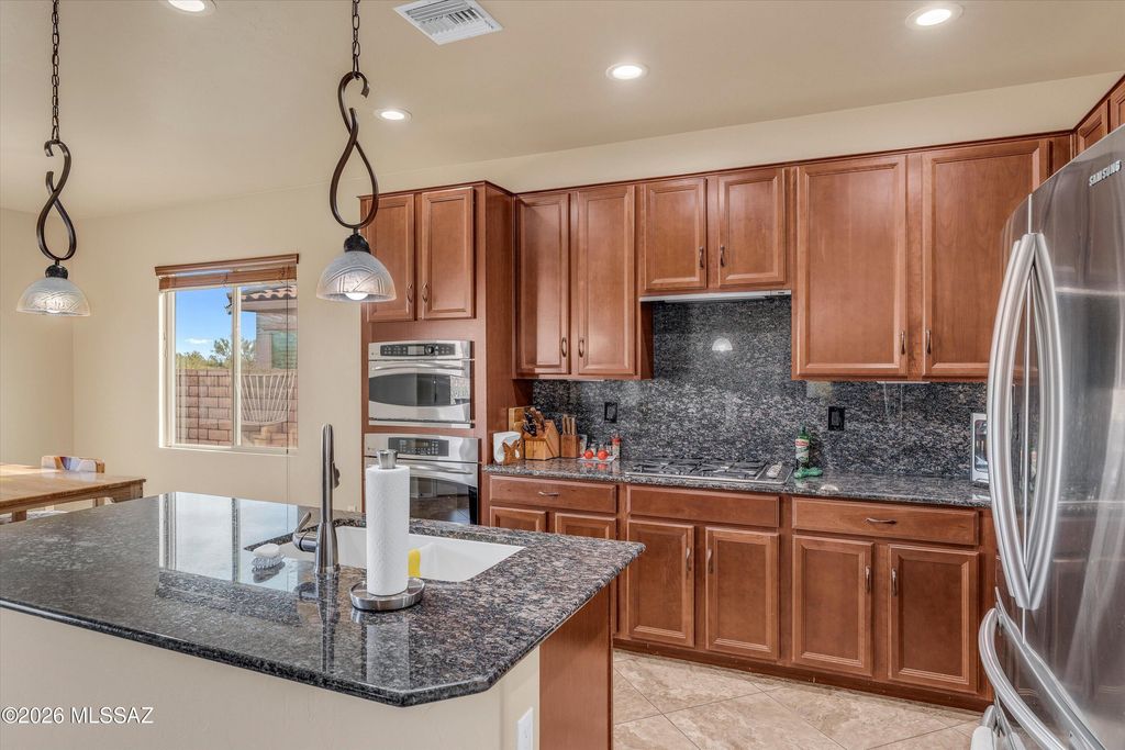 Image 12 of property listing at 11556 N Adobe Village Place, Marana, AZ 85658