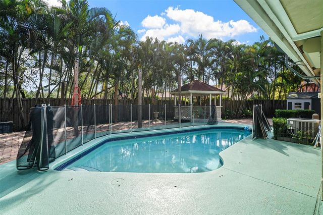 1427 Seagrape Circle, Weston, FL 33326