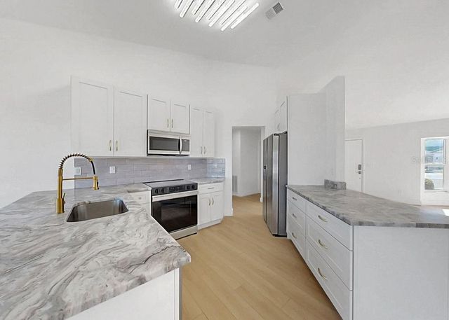 2212 WESTMINSTER MANOR LANE, Sun City Center, FL 33573