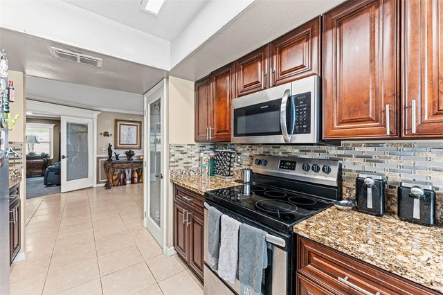 12542 IDAHO WOODS LANE, Orlando, FL 32824