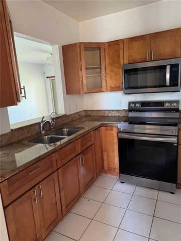 495 LAS CORTES LANE 203, Orlando, FL 32824