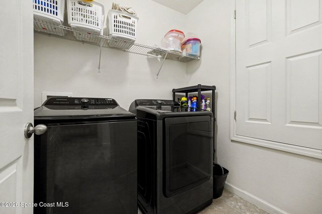 1153 Musgrass Circle, West Melbourne, FL 32904