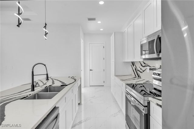 3409 24th ST SW, Lehigh Acres, FL 33976