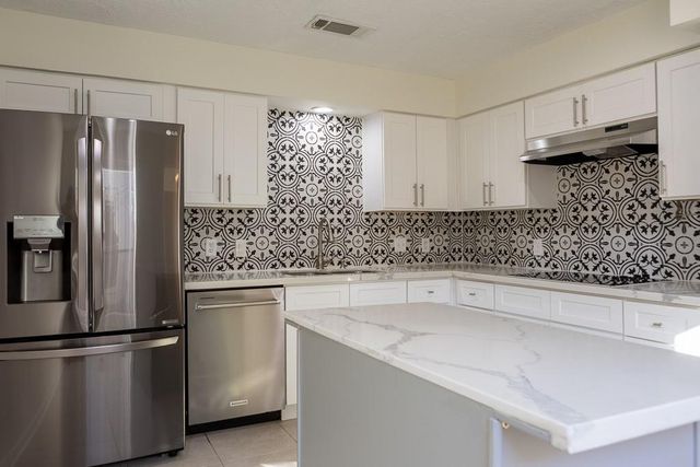 14211 Sandfield Drive, Houston, TX 77077