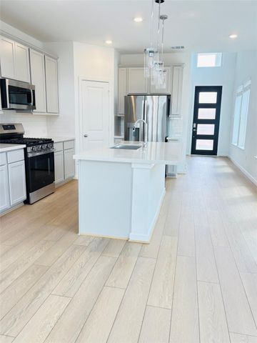 9714 Periwinkle Chase Drive, Richmond, TX 77407