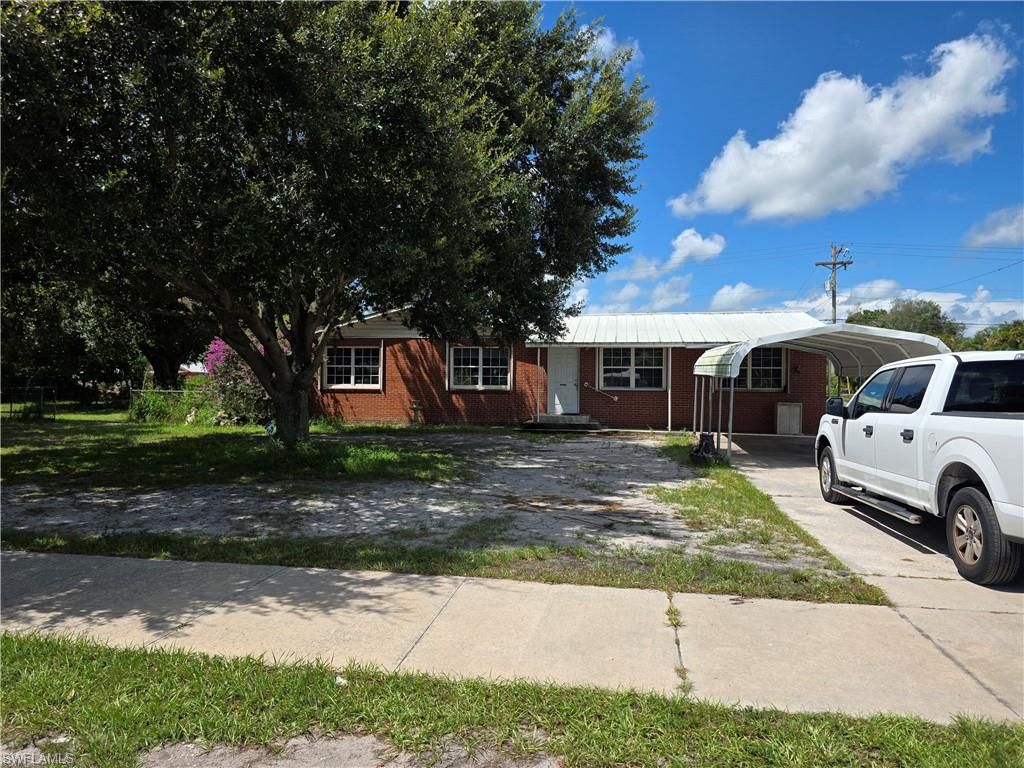 615 New Market RD W, IMMOKALEE, FL 34142 — exterior