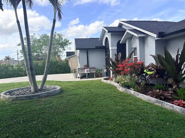 462 SE Cork Road, Port St. Lucie, FL 34984