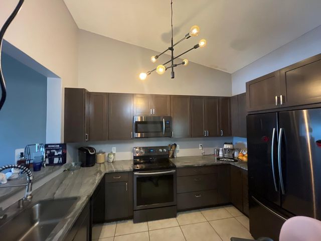 209 CYPRESS POINT Drive, Palm Beach Gardens, FL 33418