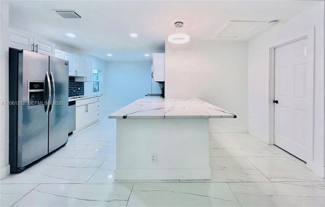 2560 Calamondin Circle, Coconut Creek, FL 33063