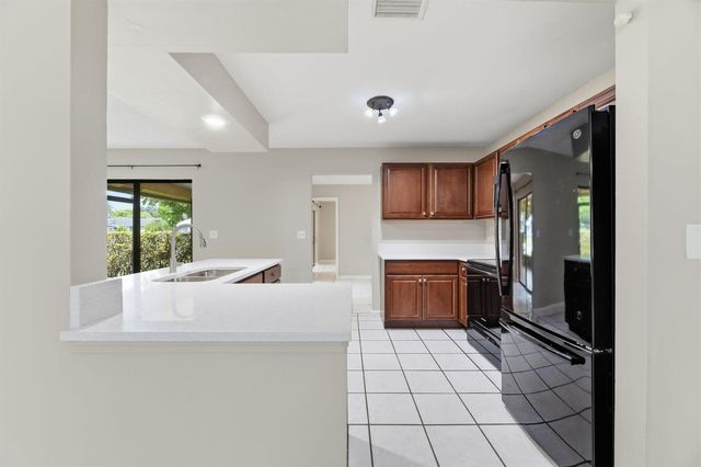 240 BOBWHITE Road, Royal Palm Beach, FL 33411