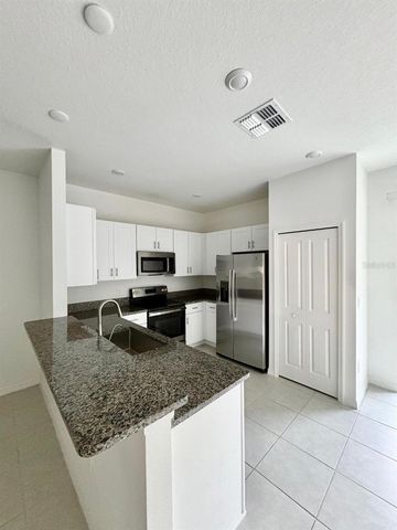 10321 TRUMPET HONEYSUCKLE WAY, San Antonio, FL 33576