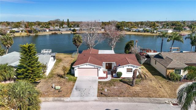 9616 LAKE CHRISTINA LANE, Port Richey, FL 34668