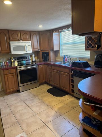 9616 LAKE CHRISTINA LANE, Port Richey, FL 34668