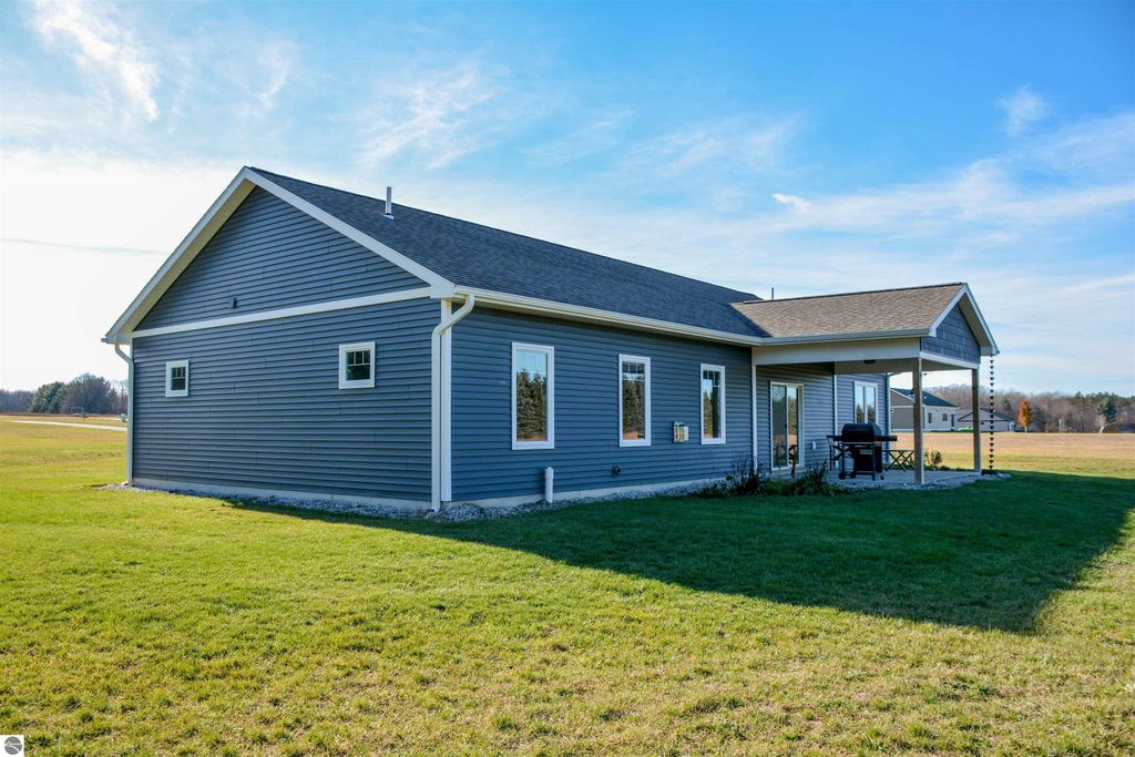 Image 54 of property listing at 5597 Timber Flats Drive, Kingsley, MI 49649