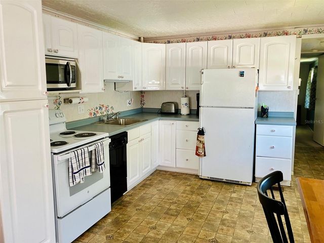 1891 ENGLEWOOD ROAD 60, Englewood, FL 34223