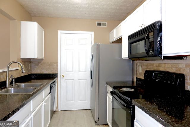 6534 Wellington Chase Court, Lithonia, GA 30058