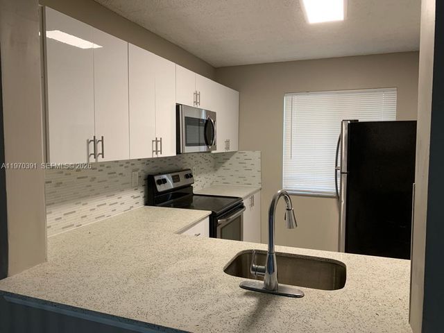 8700 N Sherman Circle 305, Miramar, FL 33025
