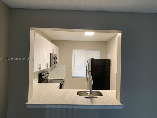 8700 N Sherman Circle 305, Miramar, FL 33025