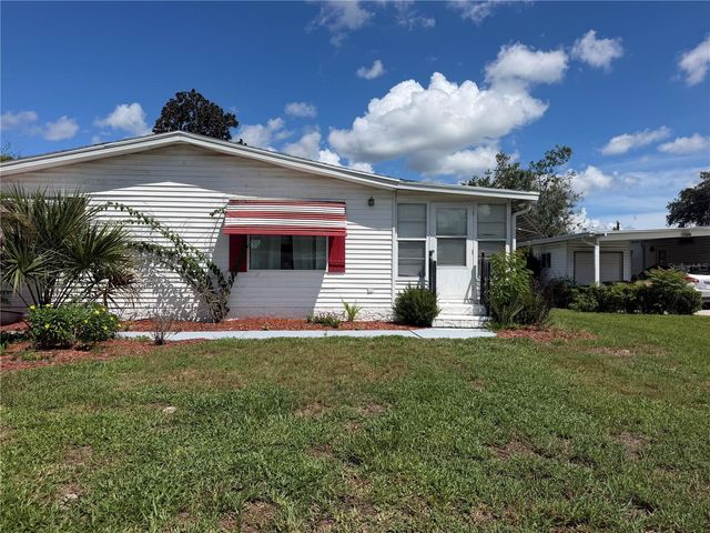 25606 BELLE ALLIANCE DRIVE, Leesburg, FL 34748