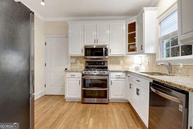 39 Braves Crossing Court, Sharpsburg, GA 30277