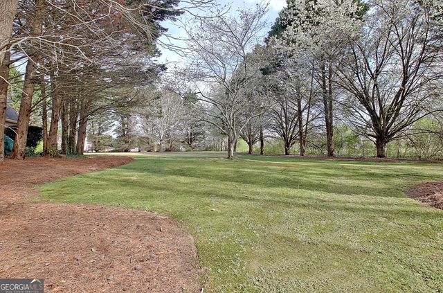 39 Braves Crossing Court, Sharpsburg, GA 30277