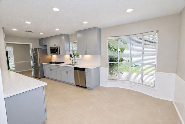 12034 Meadowdale Drive, Meadows Place, TX 77477