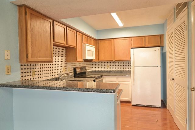 10555 Turtlewood Court 1403, Houston, TX 77072