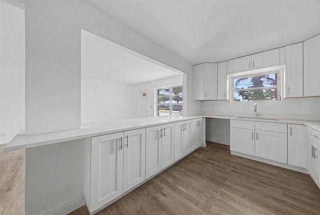 7730 W Lake Drive, Lake Clarke Shores, FL 33406