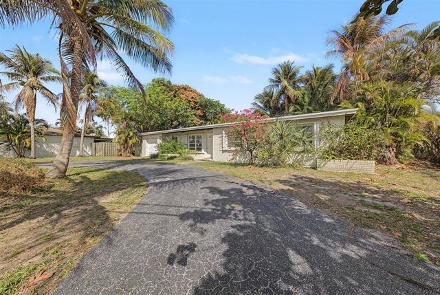 7730 W Lake Drive, Lake Clarke Shores, FL 33406