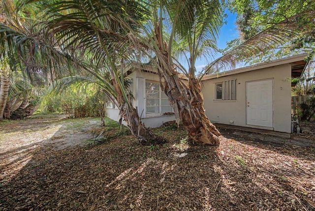 7730 W Lake Drive, Lake Clarke Shores, FL 33406