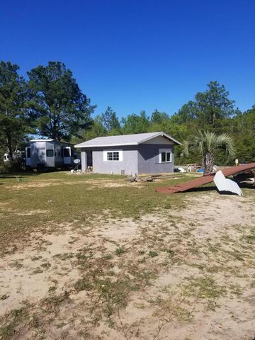 6291 Coy Burgess Loop, Defuniak Springs, FL 32435