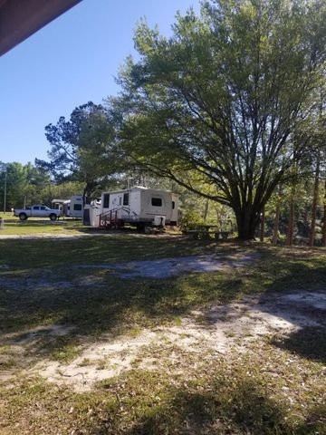 6291 Coy Burgess Loop, Defuniak Springs, FL 32435