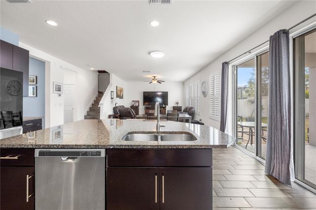 1565 FEATHER GRASS LOOP, Lutz, FL 33558