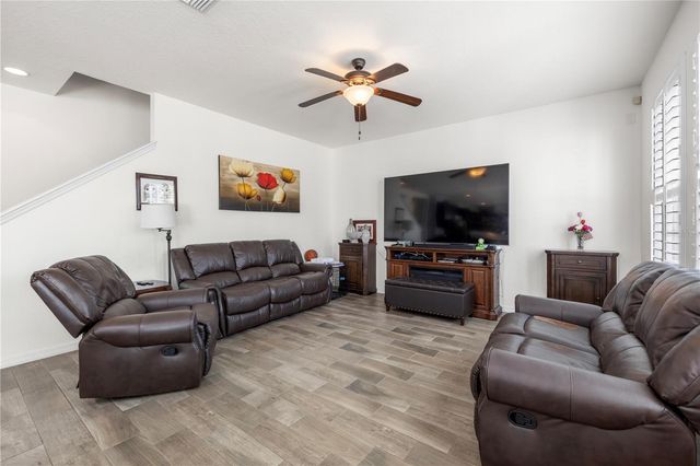 1565 FEATHER GRASS LOOP, Lutz, FL 33558