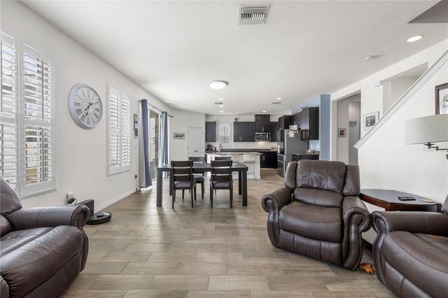 1565 FEATHER GRASS LOOP, Lutz, FL 33558