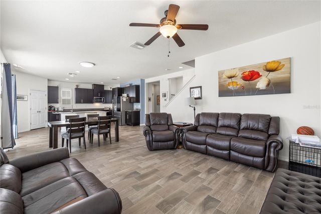 1565 FEATHER GRASS LOOP, Lutz, FL 33558