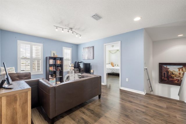 1565 FEATHER GRASS LOOP, Lutz, FL 33558