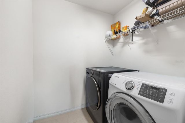 1565 FEATHER GRASS LOOP, Lutz, FL 33558