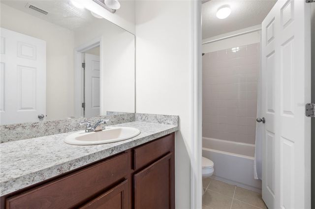 1565 FEATHER GRASS LOOP, Lutz, FL 33558