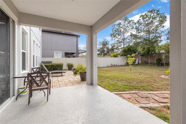 1565 FEATHER GRASS LOOP, Lutz, FL 33558