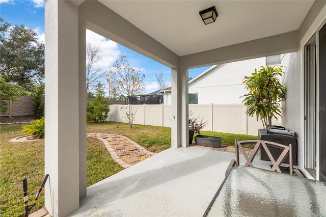 1565 FEATHER GRASS LOOP, Lutz, FL 33558