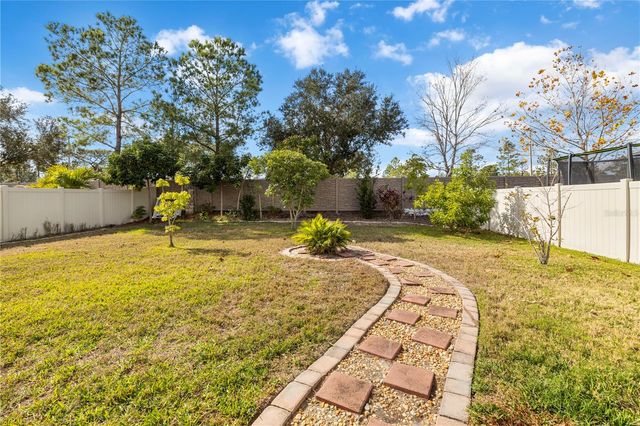 1565 FEATHER GRASS LOOP, Lutz, FL 33558